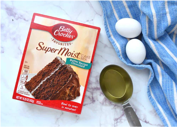 Ingredients for making cookies with cake mix including eggs and oil